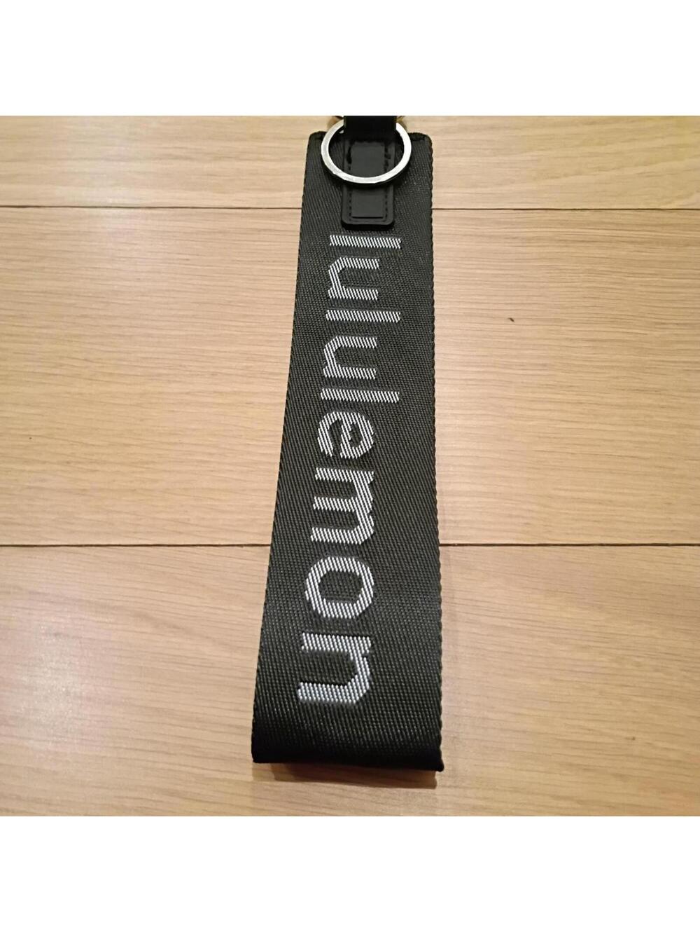 Lululemon Women's Black never lost keychain nwot